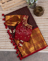 Kanchipattu saree in Dark Maroon color with a contrast red border