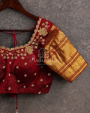 Kanchipattu saree in Dark Maroon color with a contrast red border
