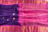 Gadwal Pattu saree in a bright and striking color combination of purple and pink!