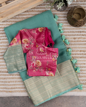 Teal Blue Silk Kota saree with a contrast hot pink floral blouse