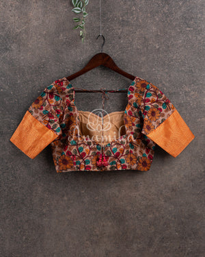 Orange Silk Kota saree with a kalamkari silk blouse