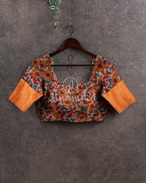 Orange Silk Kota saree with a kalamkari silk blouse