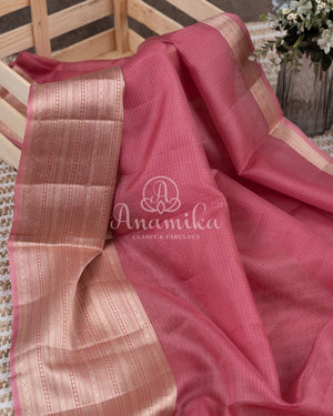 Peach Pink Silk Kota saree with a contrast powder blue floral blouse