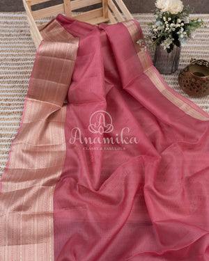 Peach Pink Silk Kota saree with a contrast powder blue floral blouse