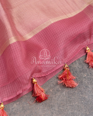 Peach Pink Silk Kota saree with a contrast powder blue floral blouse