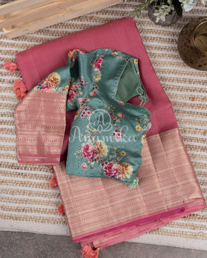 Peach Pink Silk Kota saree with a contrast powder blue floral blouse