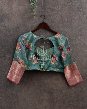 Peach Pink Silk Kota saree with a contrast powder blue floral blouse