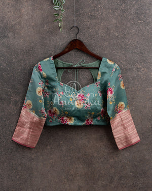 Peach Pink Silk Kota saree with a contrast powder blue floral blouse