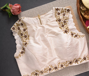 Off white color blouse with contemporary style shoulder work