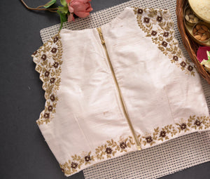 Off white color blouse with contemporary style shoulder work