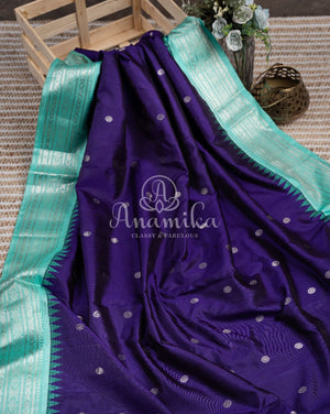 Purplish Blue Gadwal pattu saree with contrast light blue border and blouse