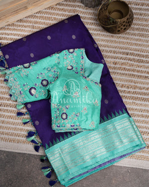 Purplish Blue Gadwal pattu saree with contrast light blue border and blouse