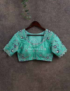 Purplish Blue Gadwal pattu saree with contrast light blue border and blouse