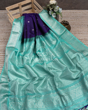 Purplish Blue Gadwal pattu saree with contrast light blue border and blouse