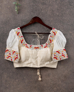 Red Crepe Bandini saree with contrast off white puff sleeves blouse