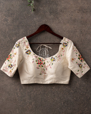 Off white blouse with multi color thread embroidery