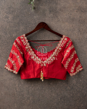 Red Blouse with cross lines work on sleeves