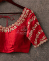 Red Blouse with cross lines work on sleeves