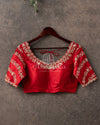 Red Blouse with cross lines work on sleeves