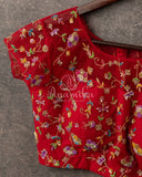 Red short sleeves blouse with net overlay and multi color sequins work