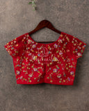 Red short sleeves blouse with net overlay and multi color sequins work