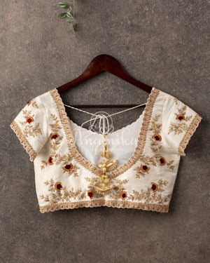 Off white short sleeves blouse with beautifully designed embroidery and red threadwork