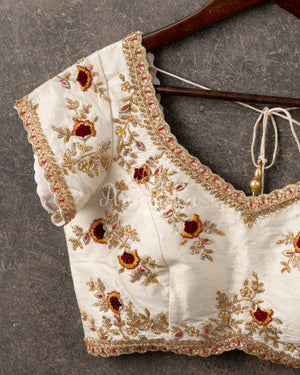 Off white short sleeves blouse with beautifully designed embroidery and red threadwork