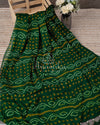 Dark Green Bandini Crepe saree with a contrast yellow blouse