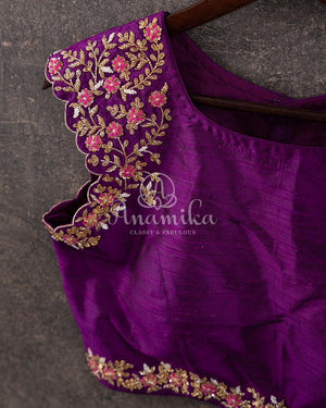Purple broad shoulder sleeveless blouse with intricately designed handwork