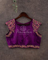 Purple broad shoulder sleeveless blouse with intricately designed handwork
