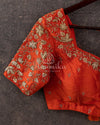 Orange Elbow sleeves blouse with beautiful gold embroidery.