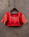 Red heavy bridal work blouse with intricately designed zardosi work