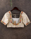 Off white blouse with beautifully designed multi color thread embroidery