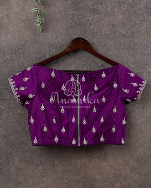 Purple Bandini Crepe saree with a mono tone purple off shoulder blouse