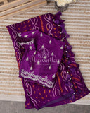 Purple Bandini Crepe saree with a mono tone purple off shoulder blouse