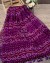 Purple Bandini Crepe saree with a mono tone purple off shoulder blouse