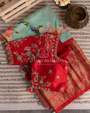 Stunning Floral Kanchi saree in a sea green red combo