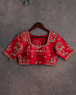 Stunning Floral Kanchi saree in a sea green red combo