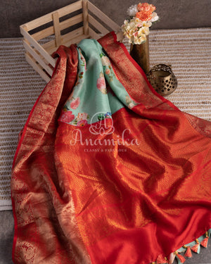 Stunning Floral Kanchi saree in a sea green red combo