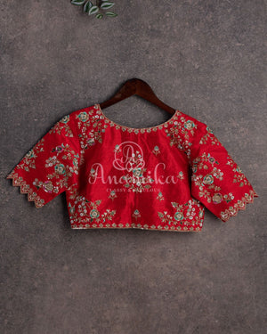 Stunning Floral Kanchi saree in a sea green red combo