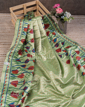 Pista Green Kanchipattu saree with floral prints border and pallu