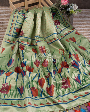 Pista Green Kanchipattu saree with floral prints border and pallu