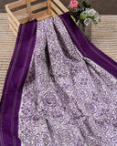 Off white and Purple Ikkat silk saree in a contemporary print