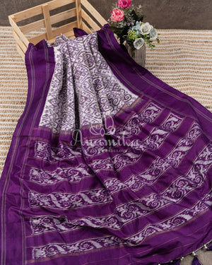 Off white and Purple Ikkat silk saree in a contemporary print