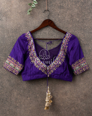 Blue/Purple Twill Silk saree paired with an intricately designed blouse