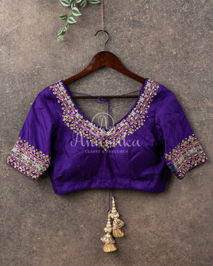 Blue/Purple Twill Silk saree paired with an intricately designed blouse