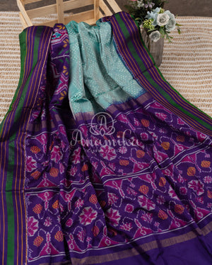 Blue/Purple Twill Silk saree paired with an intricately designed blouse