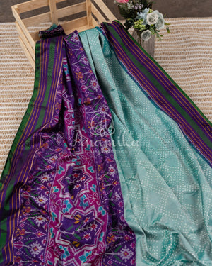 Blue/Purple Twill Silk saree paired with an intricately designed blouse