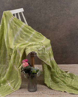 Green Chikankari and mirror work Georgette saree in leheriya pattern