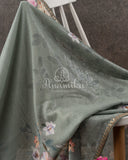 Grey georgette seqins saree paired with a self color blouse